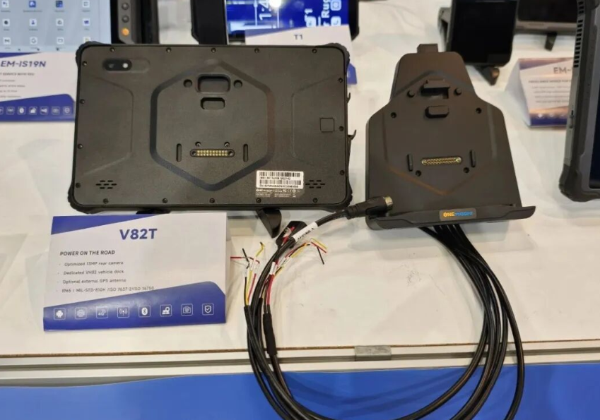 Emdoor hardware engineers demonstrating a tablet with built in barcode scanner for warehouse management to attendees at Japan IT Week.